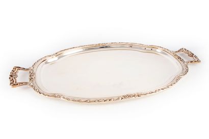 Large serving tray of oval shape in silver...