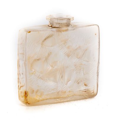 René LALIQUE René LALIQUE (1860-1945)

Flacon de parfum "Hirondelles"

Verre pressé...