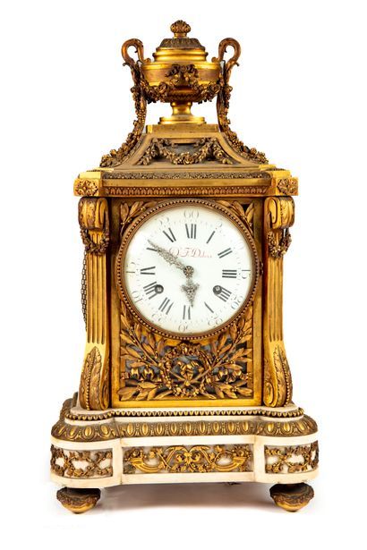 null Important gilt bronze clock richly molded and chased with garlands of flowers,...