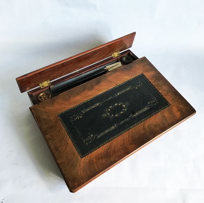 null Small travel writing case in walnut veneer. It opens with a desk flap and a...