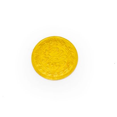 null 
Gold coin Iran

Weight : 1,4 g 
