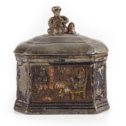 null Tobacco pot covered with rectangular shape with cut sides. The lid is in the...