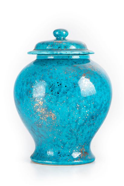 null Christian DIOR 

Covered porcelain vase with silver speckled patterns on a turquoise...
