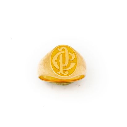 Yellow gold signet ring with the number PC...