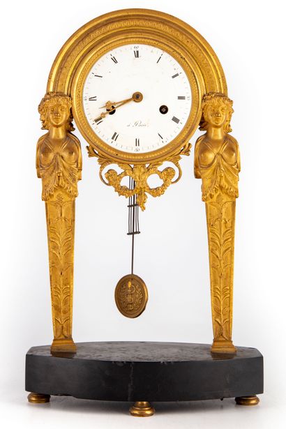 Portico clock in bronze with gilded patina...