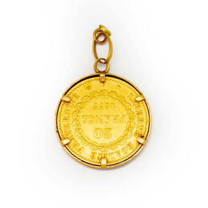  Pièce de 20 francs or montée en pendentif 
Poids : 7,5 g.