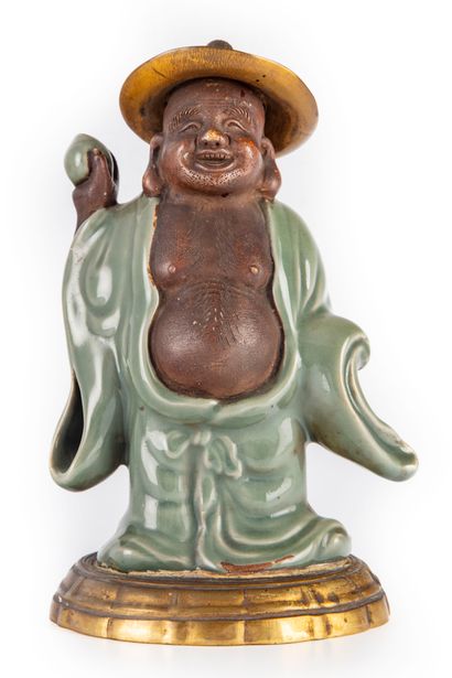 null CHINA 

Statuette of a character (Poussah) in partially glazed ceramic. Base...