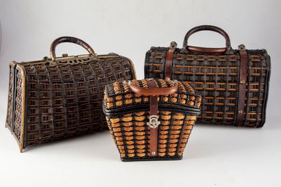 null Folk Art - Basketry

Set of three wicker baskets, leather handles and metal...