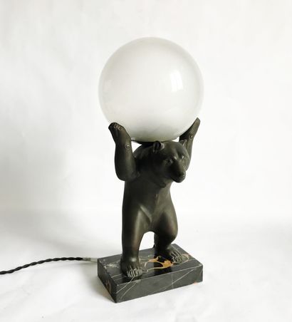 null Irénée ROCHARD (1906 - 1984)

Lamp made of a bear statuette in regula supporting...