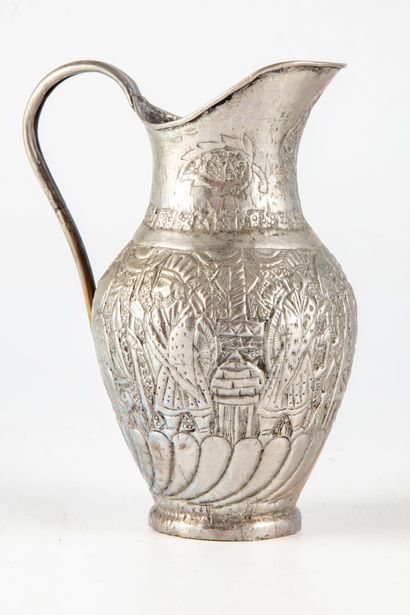 null JUDAICA

Metal ewer for the Jewish cult with chiseled rotating decoration of...