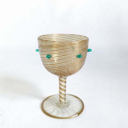 null Small blown glass footed glass with golden filigree. 

Probably Venice in the...