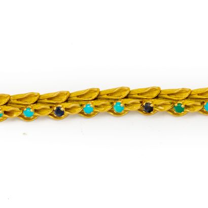 null Articulated bracelet in yellow gold with leaf-shaped links set with alternating...