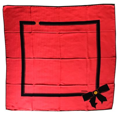 CHANEL CHANEL

Red silk square with Chanel motif in overprint and black ribbon decoration...