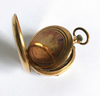 null Pocket watch in yellow gold. White dial with Roman numerals and iron track for...