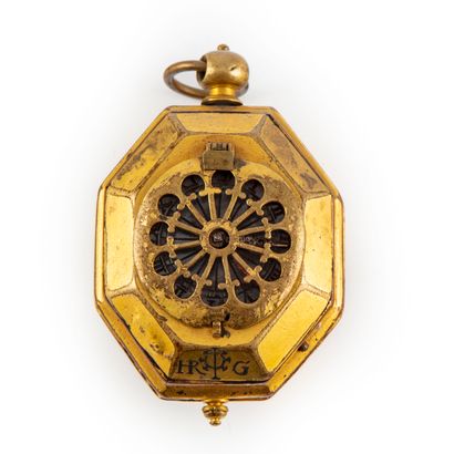 null Small Puritan watch of polygonal shape in molded brass. Metal dial with Roman...