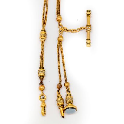 Yellow gold chatelaine decorated with a coulant,...