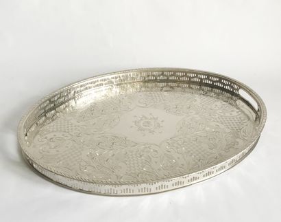 null Large tray of oval shape out of silver plated metal with engraved decoration...
