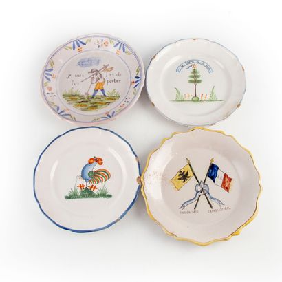 null Set of four glazed earthenware plates with revolutionary decoration

D. 24 cm

Cracks,...