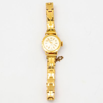 null COMET 

Lady's watch, yellow gold dial, gilt metal bracelet

Gross weight :...