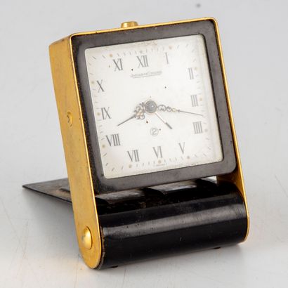 null JAEGER

Table or travel clock with alarm function, in gold and black lacquered...