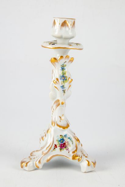 null Tripod candlestick in porcelain, with gilded decoration and flowers. 

Mark...