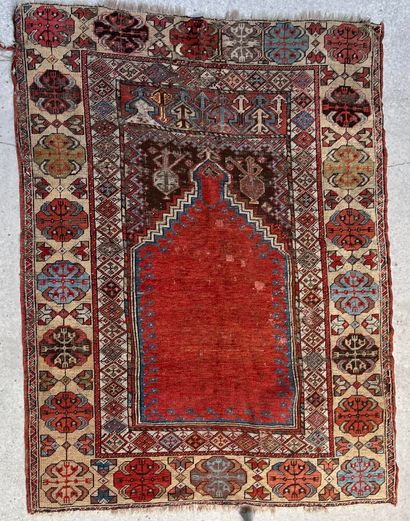 null Persian prayer rug with a wide border decorated with medallions.

166 x 126...