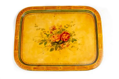 null Large sheet metal tray with polychrome decoration of flowers on a yellow background

85...