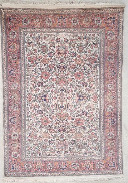 null Persian carpet type Kechan decorated with a sowing of flowers and interlacing...