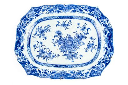 null Enameled earthenware dish decorated with flowers in blue and white in the taste...