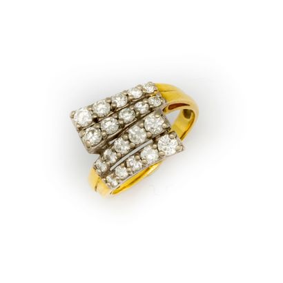 Yellow gold ring (18K) crossing on the top...