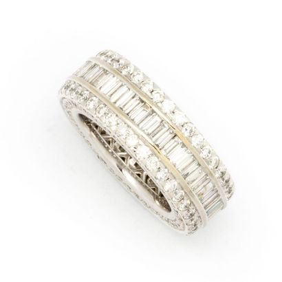null Large white gold wedding band set with a line of baguette diamonds between two...