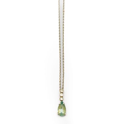 null Claw-set pendant of a pear-shaped aquamarine surmounted by three small diamonds...
