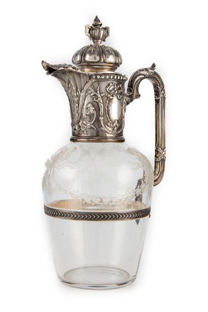 null Crystal ewer engraved with laurel garlands and ribbon bows, silver frame with...