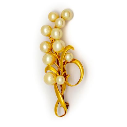 Brooch in yellow gold (18K) in the shape...