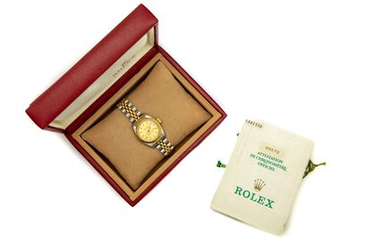 ROLEX ROLEX "Oyster Perpetual Date
Steel and 18k yellow gold wristwatch, round steel...