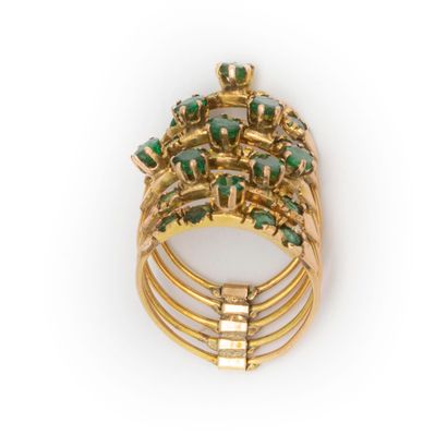 null Yellow gold (18K) ring composed of five mobile rings, connected to each other...