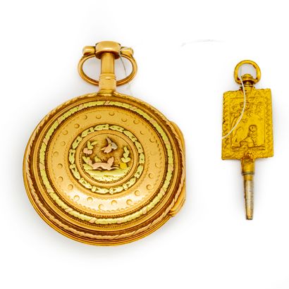 Yellow gold pocket watch, the back decorated...
