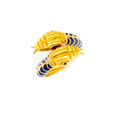 Yellow gold ring with double snake head and...