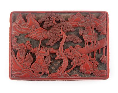 CHINE CHINA - 19th century
Rectangular lacquer box with relief decoration in cinnabar...