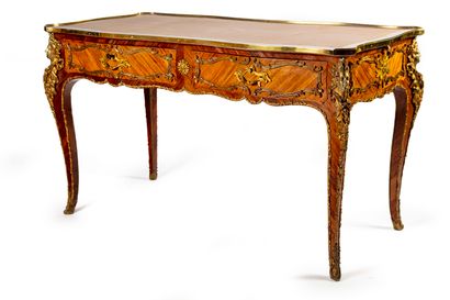 null Flat desk in marquetry, with a rich decoration of gilded bronzes in the Rocaille...