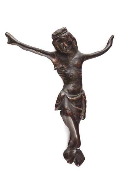 null Sconce Christ in embossed copper with traces of gilding. Crowned head inclined...
