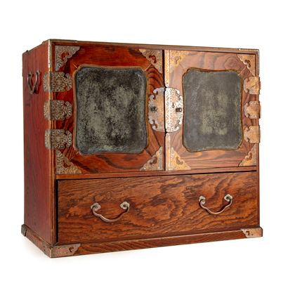 JAPON JAPAN 
Small cabinet in native wood opening with two doors revealing small...