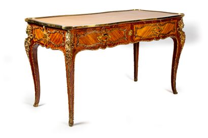 null Flat desk in marquetry, with a rich decoration of gilded bronzes in the Rocaille...