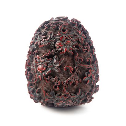 CHINE CHINA - 19th century
Fruit-shaped box in cinnabar red lacquer with high relief...