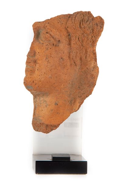 null GREAT GREECE - 4th century B.C.
Fragment of a volute crater with a Gorgon head
H....