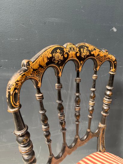 null Small blackened wood chair, decorated with flowers and golden scrolls, Napoleon...