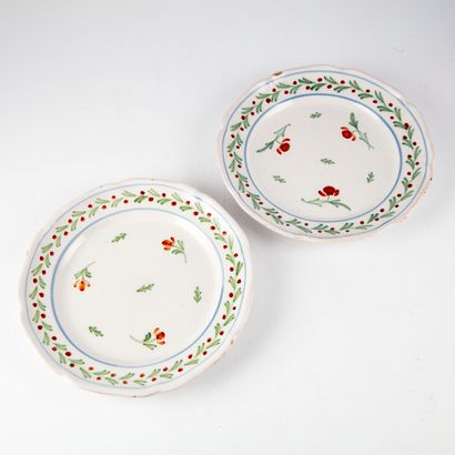 null In the taste of NEVERS

Pair of enamelled earthenware plates with polychrome...