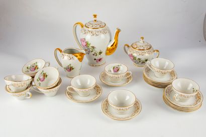 null LIMOGES 

Porcelain tea set with polychrome decoration of flowers and golden...