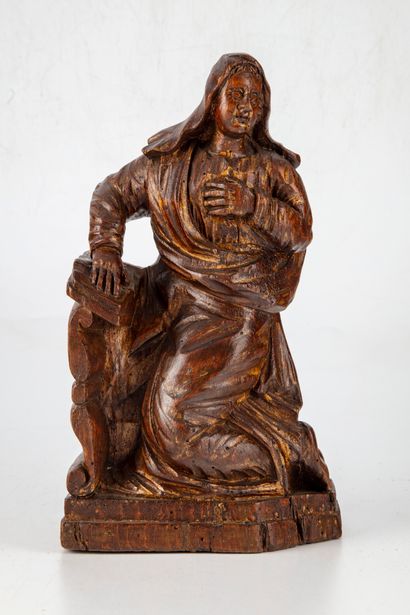 null Statuette of the Virgin kneeling in carved wood, old traces of polychromy

H....