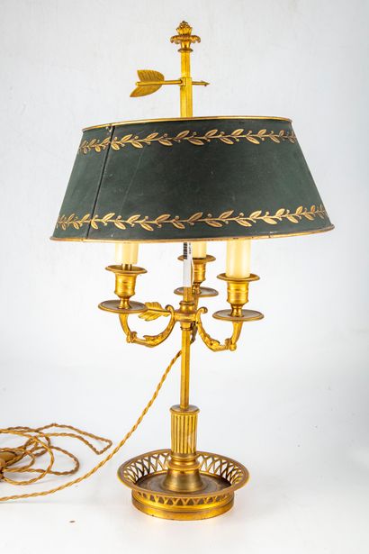 null A gilt bronze hot water bottle lamp with three finely chiseled scroll arms,...